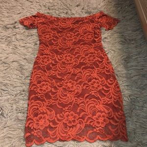 Orange lace. Off the shoulder dress.